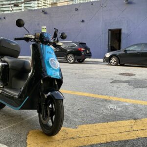 This an image of an electric scooter parked illegally on the street.