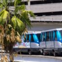 This is an image of the two Metrorail cars moving through Downtown Miami